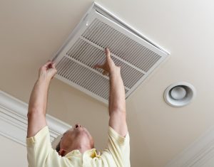 Bonaire Ducted Heating Manual 300x235 - Senior man opening air conditioning filter in ceiling